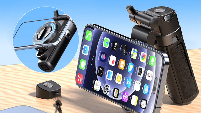 The folded device sitting next to a smartphone for scale, emphasizing its compact 5-inch size.