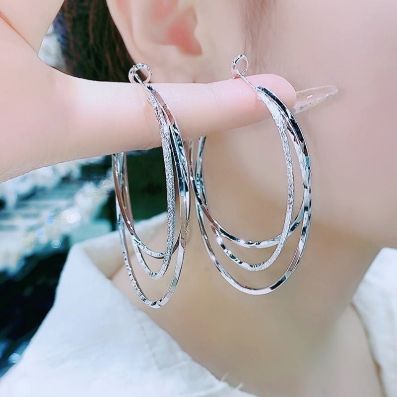 Boucles d'oreilles créoles multicouches