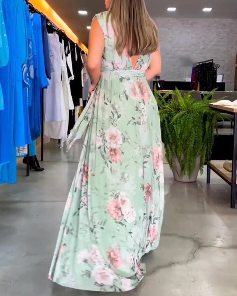 Elegancka sukienka bez rękawów z kwiatowym nadrukiem i dekoltem w kształcie litery V