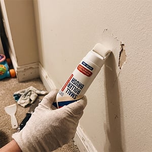 Wall touch-up roller covering wall scuffs