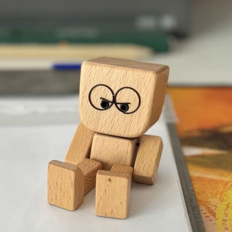 Figurine d'homme en bois tremblant