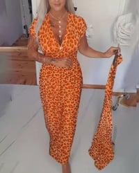 Elegantes Kleid mit Leopardenmuster und V-Ausschnitt