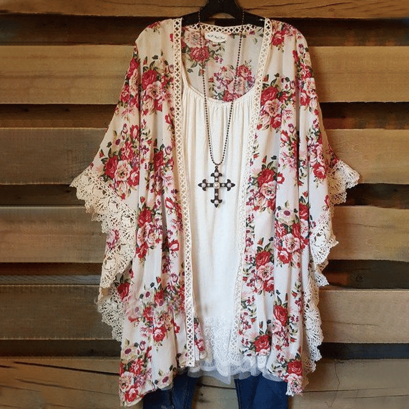 Cardigan en dentelle avec empiècements fleuris