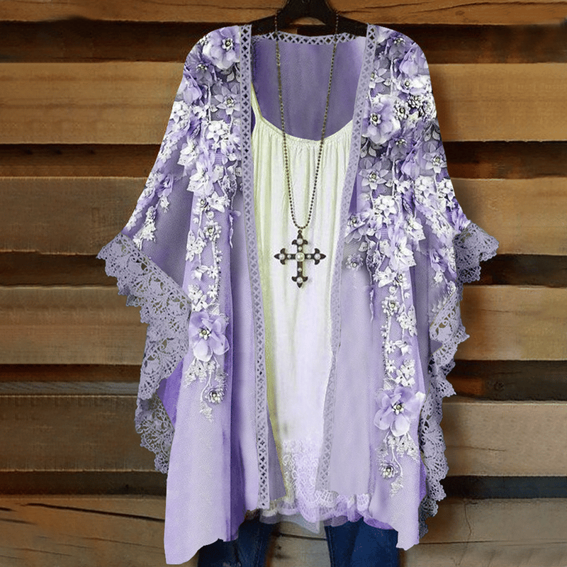 Cardigan en dentelle avec empiècements fleuris