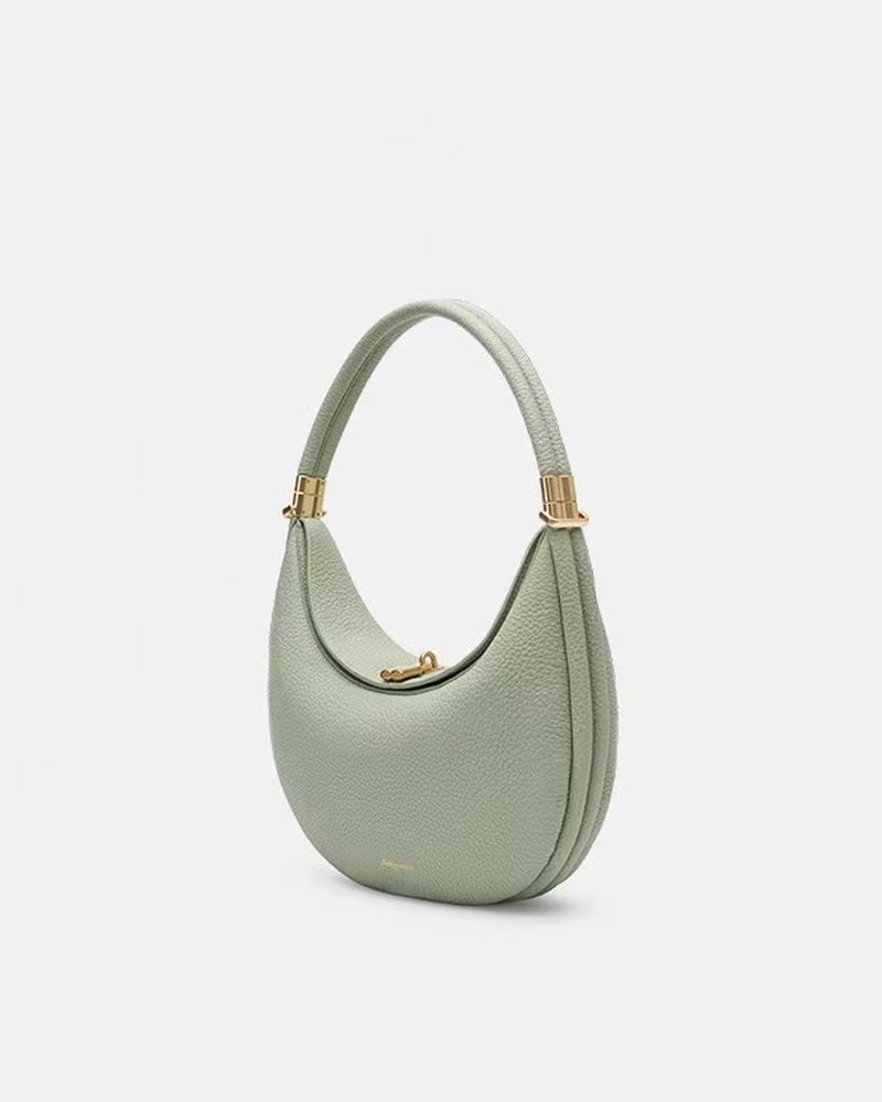 Ensfarvet elegant halvmåneformet skuldertaske