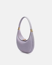 Ensfarvet elegant halvmåneformet skuldertaske