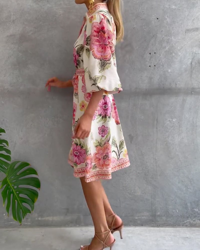 Bedrucktes Kleid mit Laternenärmeln und Reverskragen