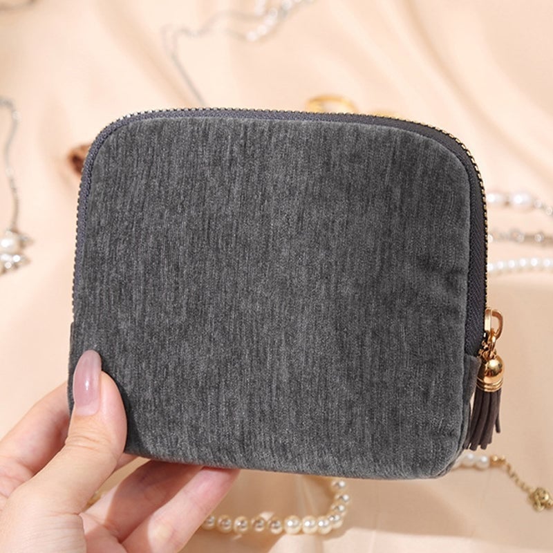 Mini Schmucktasche mit Quasten-Reißverschluss