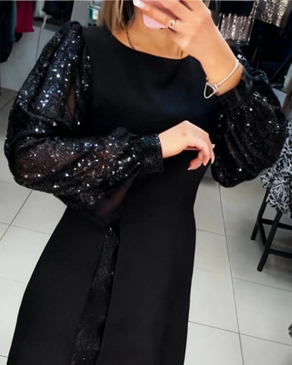 Elegantes Kleid mit Puffärmeln und Patchwork-Details