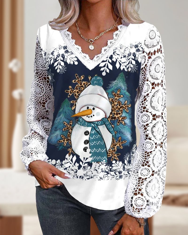 Bluse med blonde- og snemandsmønster
