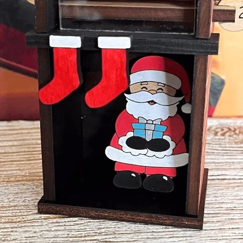 De kerstman komt door de aftelkalender voor de schoorsteen