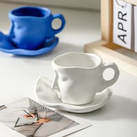 Kyssnades ansikte keramisk kaffe mugg