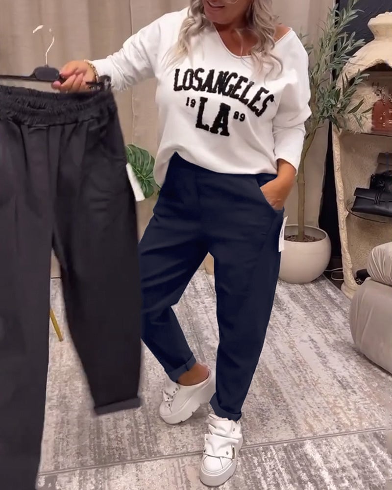 Pantalon décontracté de couleur unie avec poche