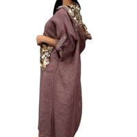 Maxi abito con cappuccio in paillettes a squame di pesce
