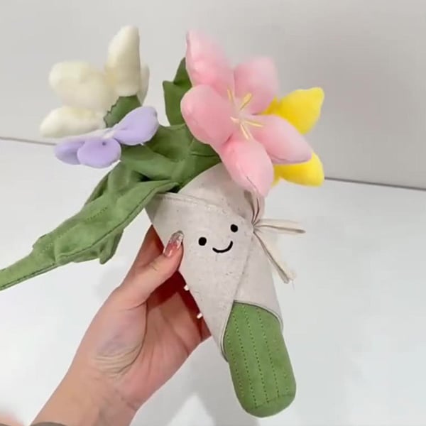 Sødt plysdyr med blomsterbuket