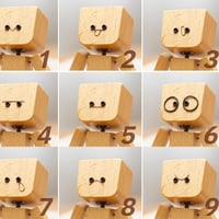 Figurine d'homme en bois tremblant