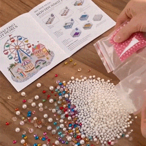Animated close-up showing the craft materials and gems being added to a miniature carousel
