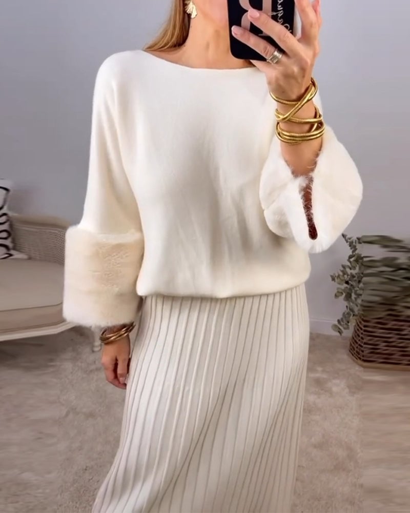 Elegant hvid sweater med plysmanchetter