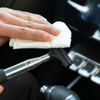 Retractable Rear-View Mirror Wiper with Layered Brush Head