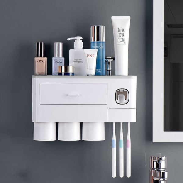 Toothbrush holder with a drawer