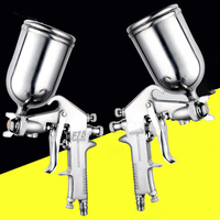 Pneumatisk spraypistol med topbeholder