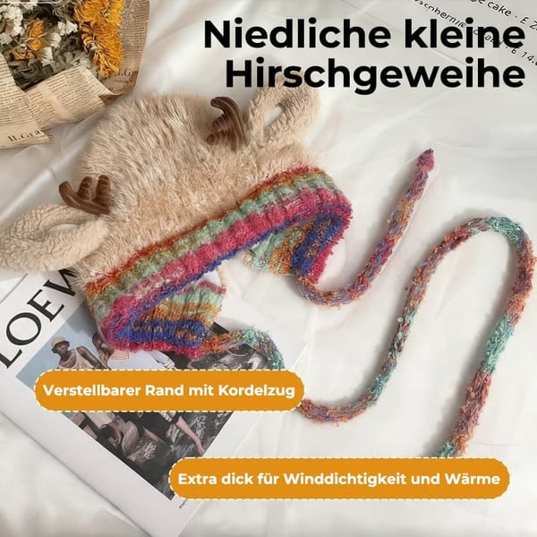 Niedliche Weihnachtsmütze mit Geweihmotiv
