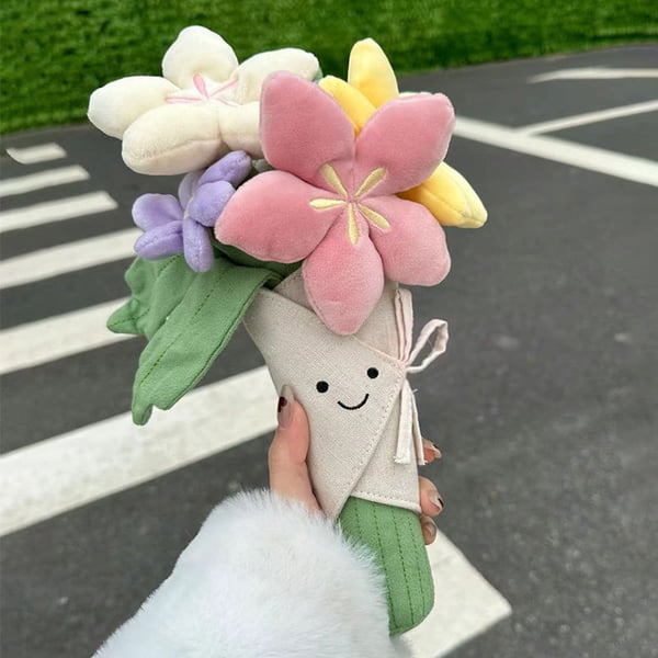 Sødt plysdyr med blomsterbuket