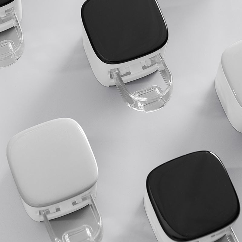 Wall-mounted toothpaste squeezer