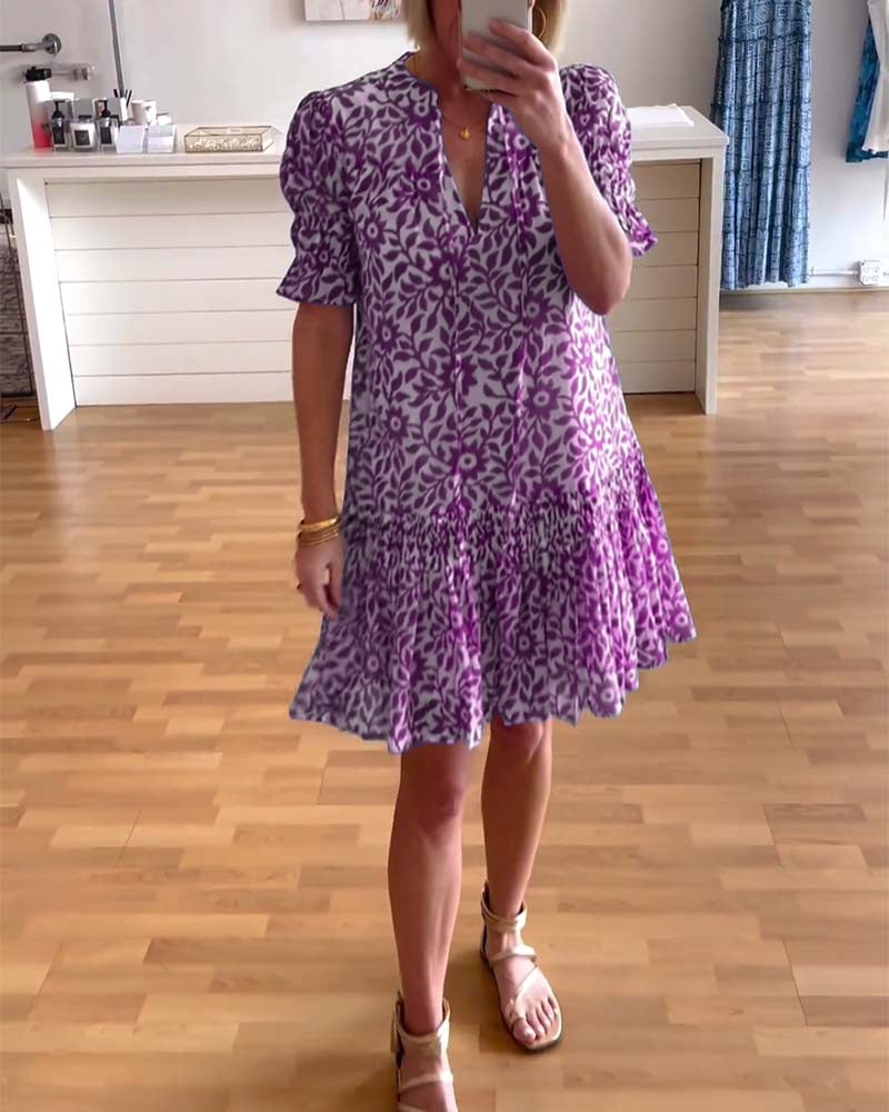 Robe plissée à imprimé floral et manches bouffantes