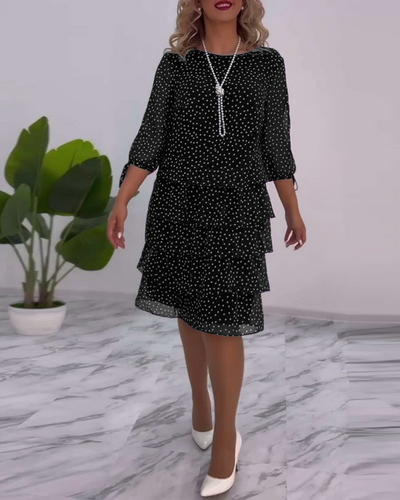Robe élégante superposée à imprimé pois