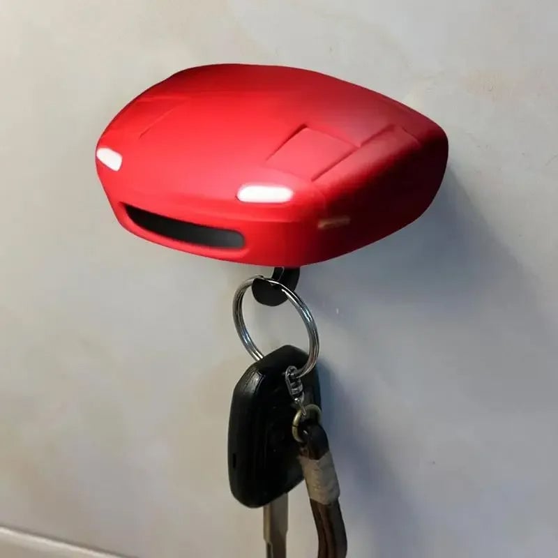 Retro autosleutelhanger met open koplampen