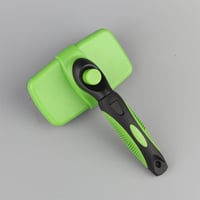Brosse autonettoyante pour chiens/chats
