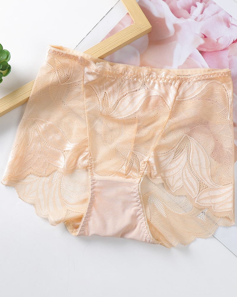Ensfarvede sexede blondetrusser