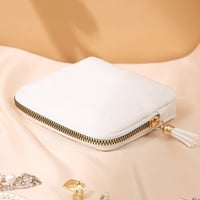 Mini Schmucktasche mit Quasten-Reißverschluss