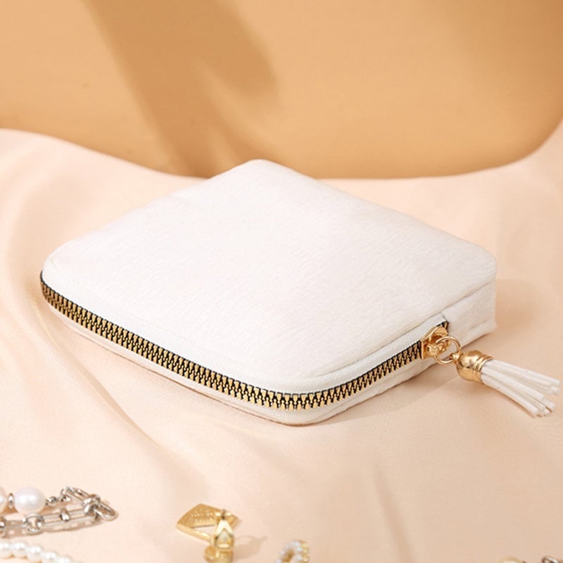 Mini Schmucktasche mit Quasten-Reißverschluss