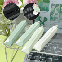 Dubbelhäftande tejprulle för scrapbooking