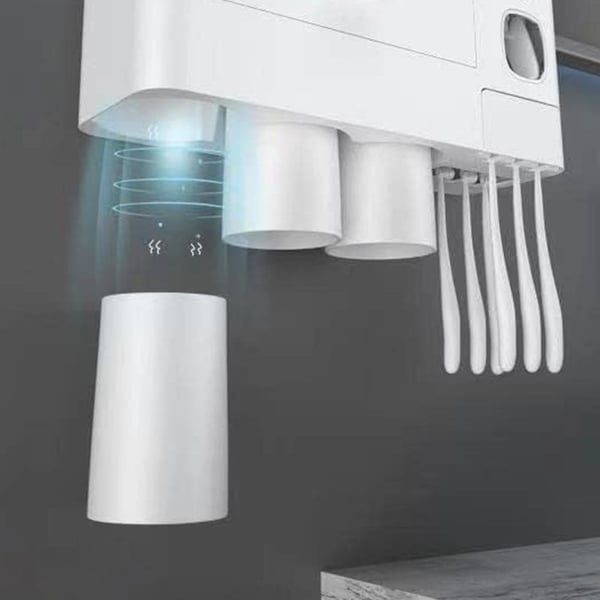 Toothbrush holder with a drawer