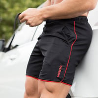 Monogram enfärgade sportshorts för män