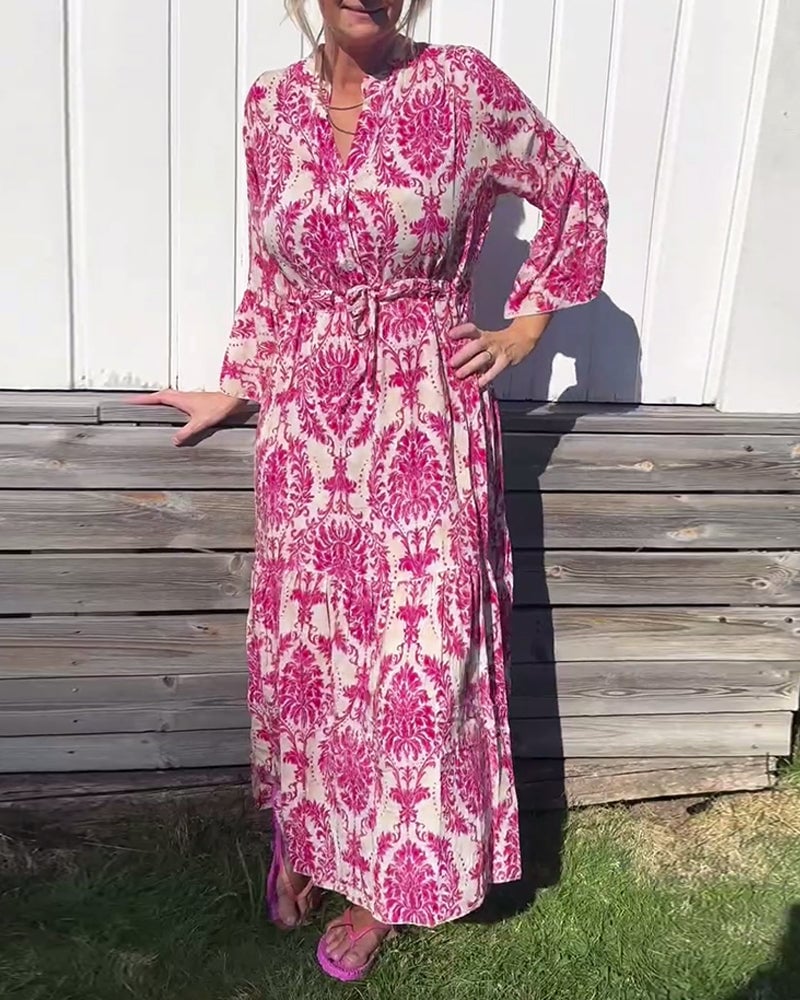 Jurk met trekkoord en klokmouwen met print