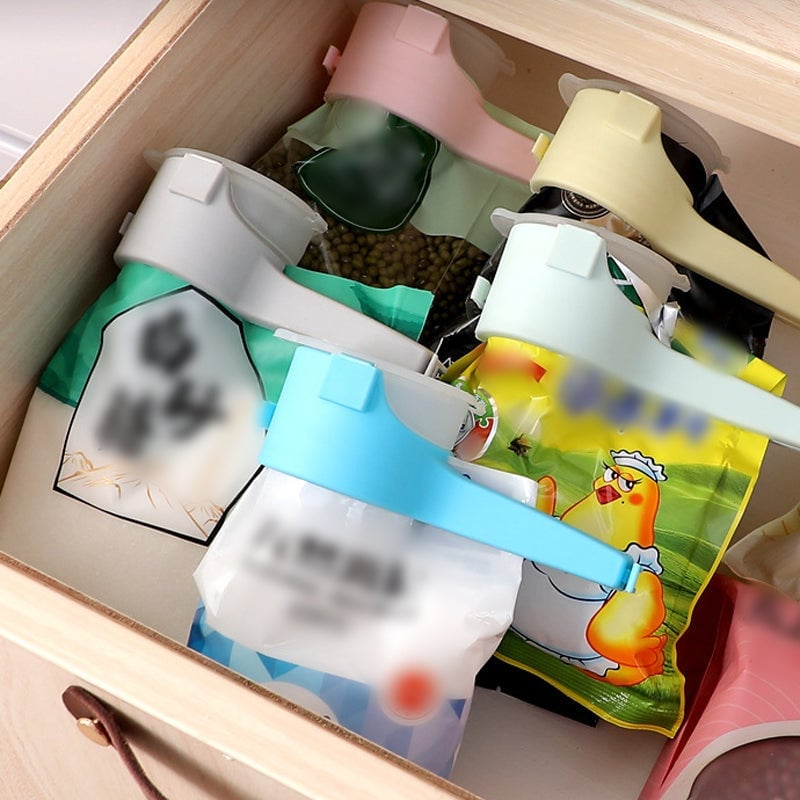 Clip di fissaggio per la conservazione degli alimenti 2 in 1
