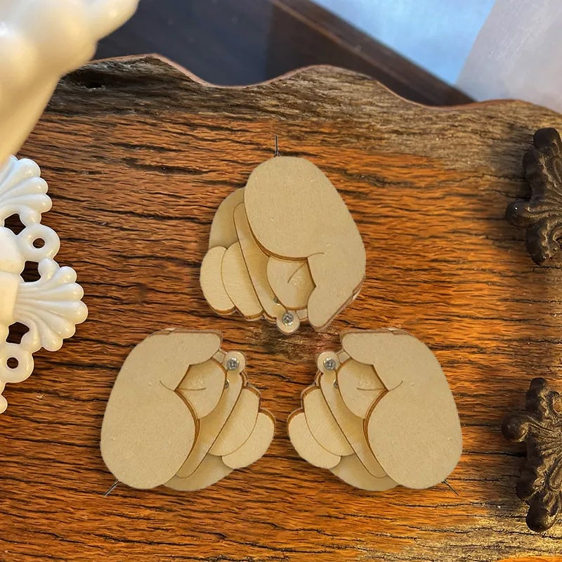 Morsom trefingerbrosje