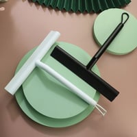 Rubber strip cleaning wiper