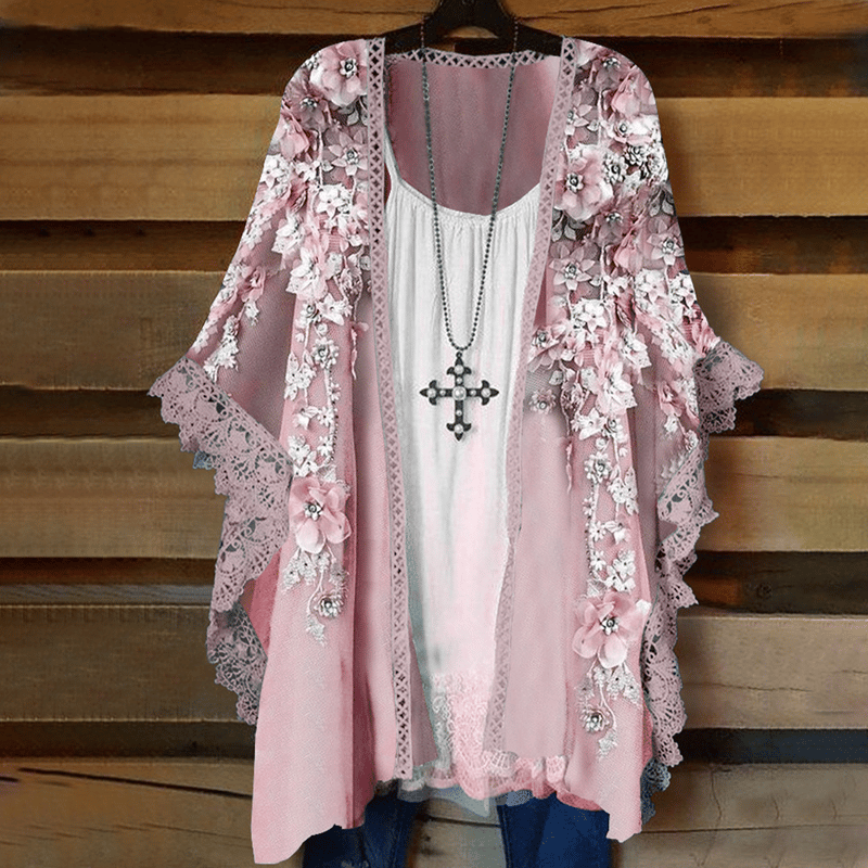 Cardigan en dentelle avec empiècements fleuris