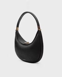 Ensfarvet elegant halvmåneformet skuldertaske