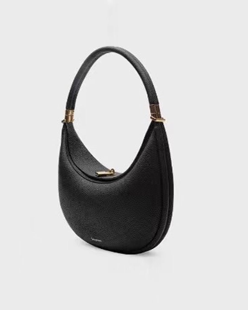 Ensfarvet elegant halvmåneformet skuldertaske